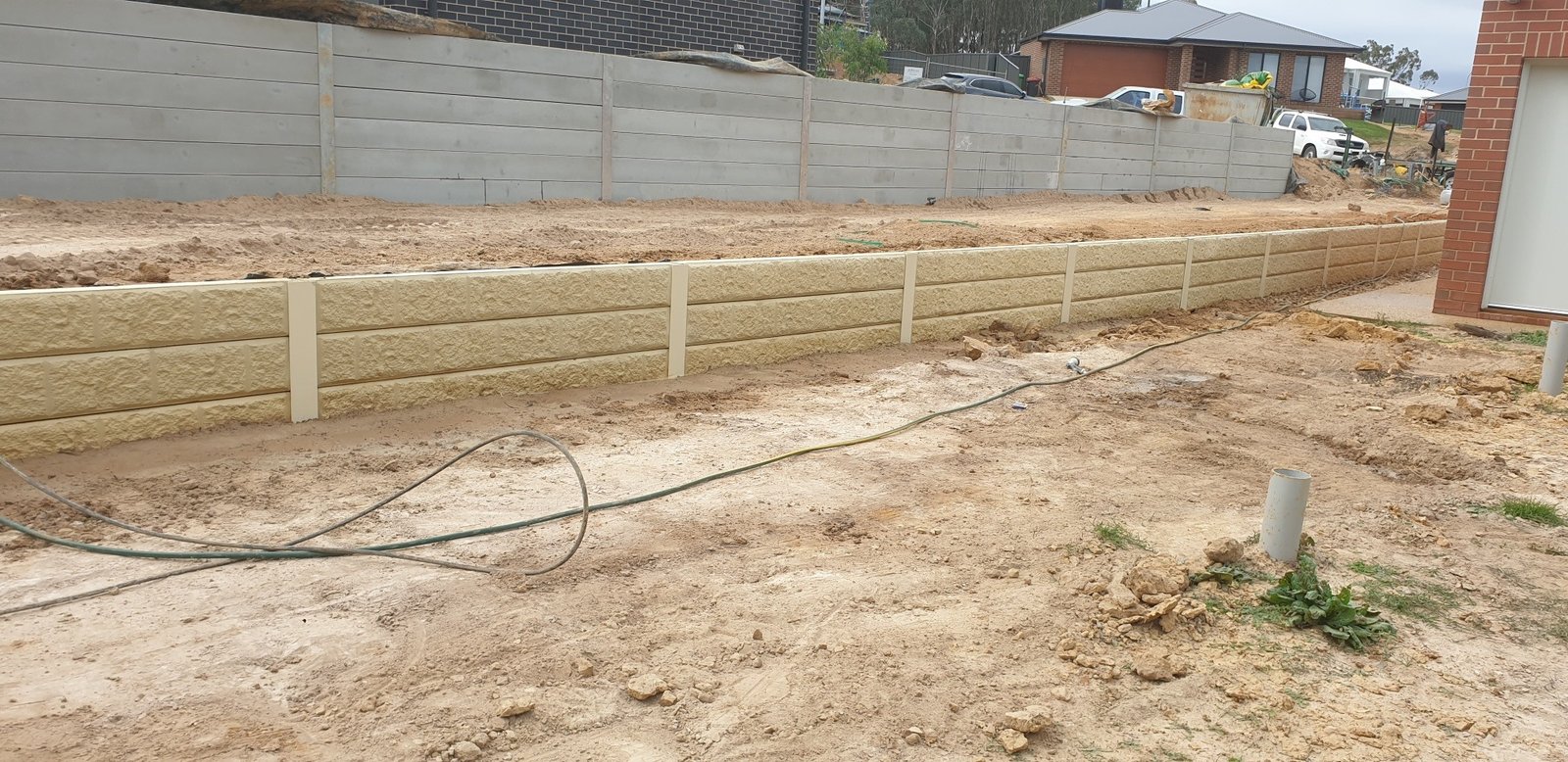 Tiered concrete sleeper retaining walls built by A1 Retaining in the Albury Wodonga region