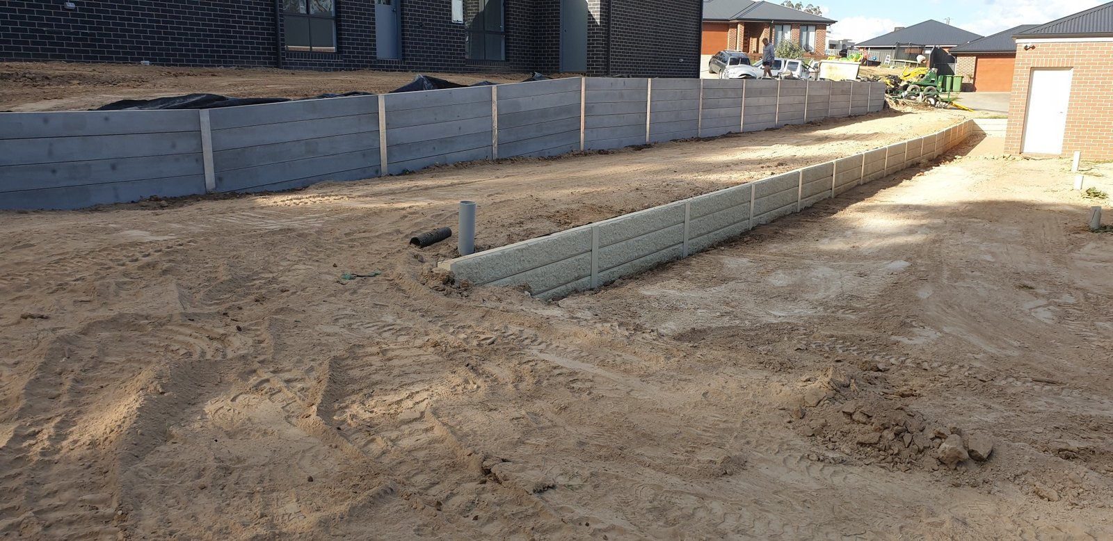 Two-level concrete sleeper retaining wall construction by A1 Retaining