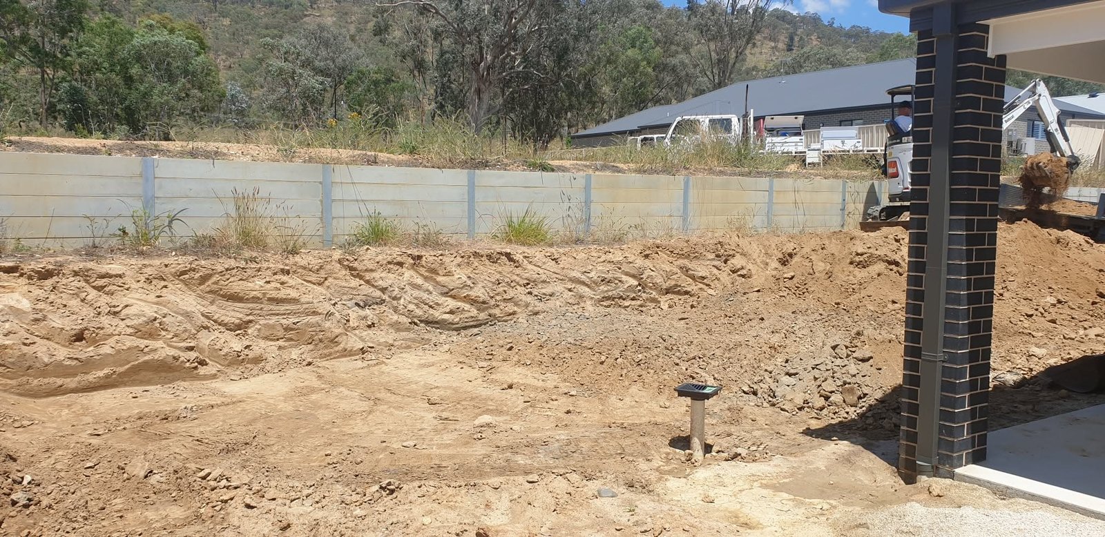 Earthworks and excavation preparing backyard levels