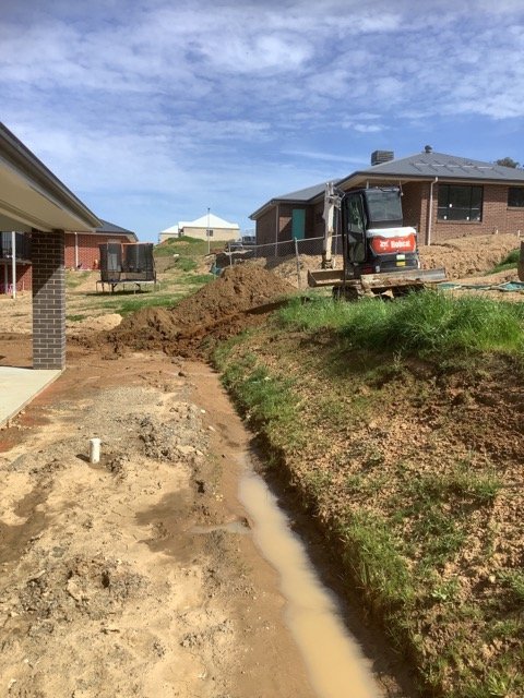 Excavated drainage channel during residential earthworks