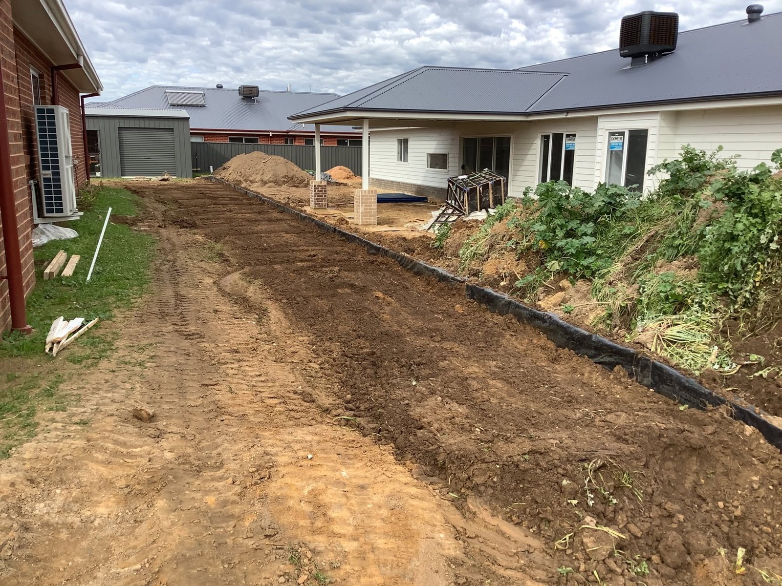 Earthworks and backyard level preparation by A1 Retaining