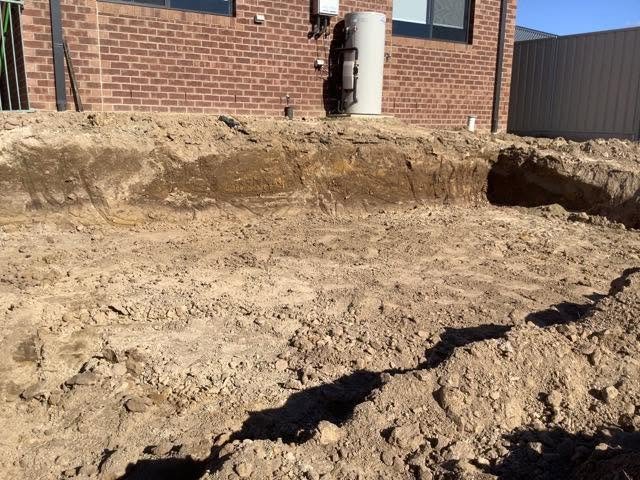 A1 Retaining construction showing residential site access and ground conditions